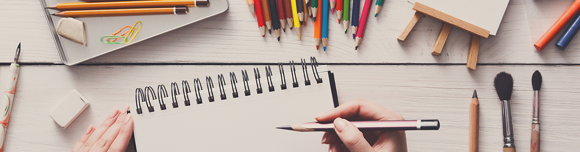 Pencils, crayons, paint brushes and a blank canvas Pencils, crayons, paint brushes and a blank canvas